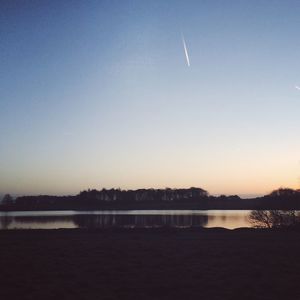 Scenic view of sunset over calm sea