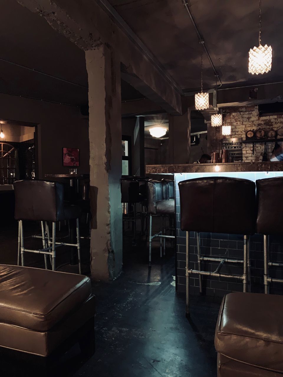 EMPTY CHAIRS AND TABLE IN RESTAURANT