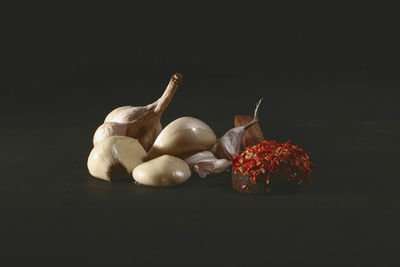 Close-up of fruits against black background