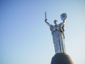 Low angle view of statue against clear sky