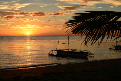 Scenic view of sea during sunset