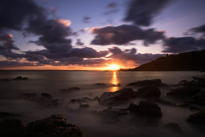 Scenic view of sea against sky during sunset