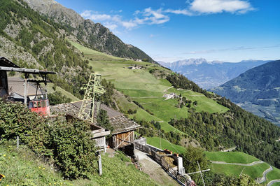 Scenic view of landscape and mountains against sky