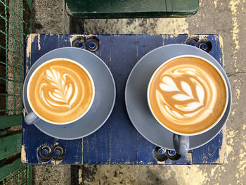 High angle view of cappuccino on table