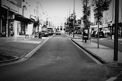 Street in city against sky