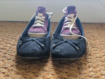 Close-up of shoes on floor