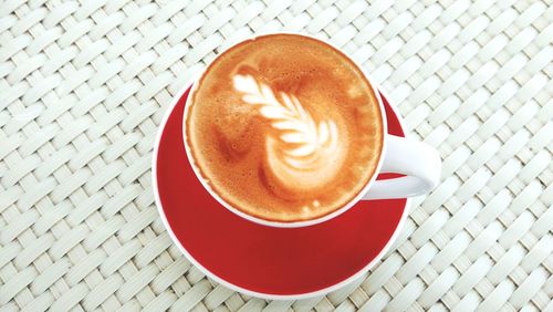 High angle view of cappuccino on table