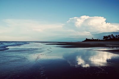 View of sea against cloudy sky