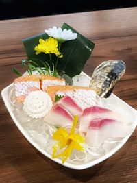 High angle view of various flowers on table