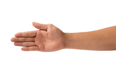 Close-up of person hand against white background