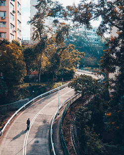 High angle view of man walking on highway