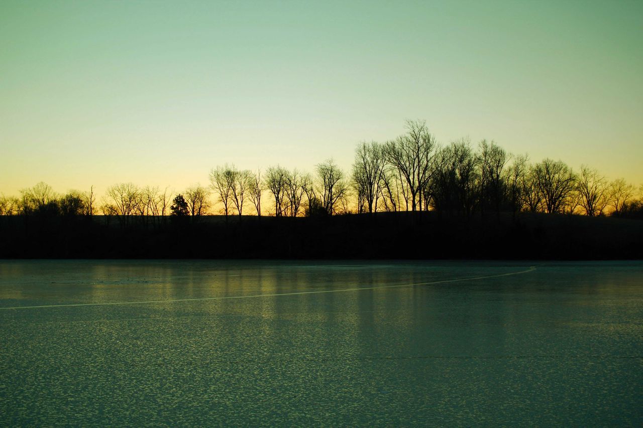 SCENIC VIEW OF LAKE AGAINST CLEAR SKY