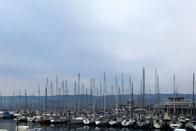 Sailing boats docked in an old port in trieste, italy,