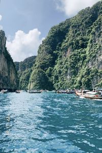 Scenic view of sea against mountain