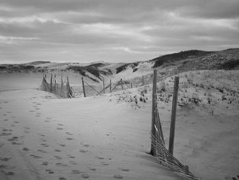 Scenic view of beach against sky