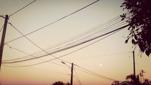 Low angle view of electricity pylon