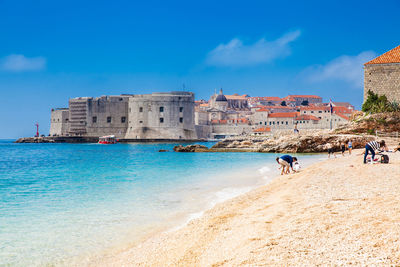 The beautiful banje beach and dubrovnik city