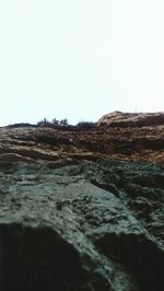 Surface level of land against clear sky