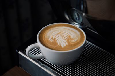 Close-up of cappuccino on table