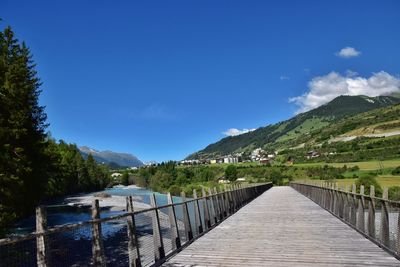 Scenic view of lake against blue sky