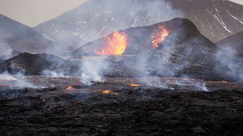 Panoramic view of fire on land