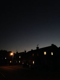 View of illuminated buildings at night