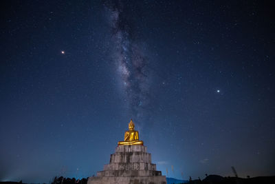 Low angle view of cathedral against sky at night