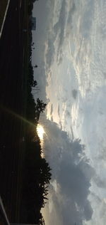 Scenic view of silhouette trees against sky