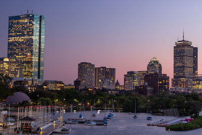 Setting sun over boston skyline