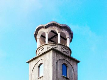 Low angle view of building against blue sky