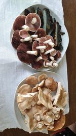 High angle view of mushrooms in plate on table