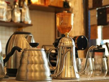 Metallic tea kettle on kitchen counter