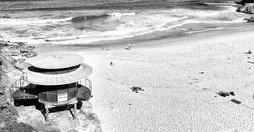 High angle view of chairs on beach