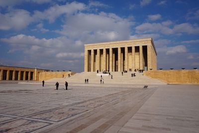 People at anitkabir against sky