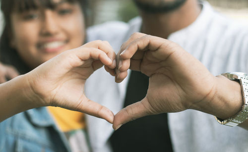 Close-up of man holding hands