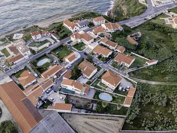 High angle view of buildings and houses in city