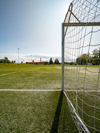 Soccer field in the bright light of summer day. prepared playground for finnal match