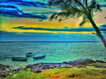 Scenic view of sea at sunset