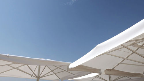 Low angle view of beach umbrellas 