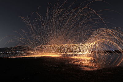 Firework display at night