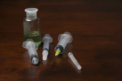 High angle view of bottles on table