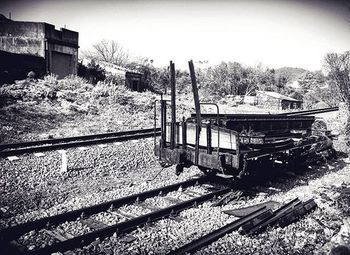 Railroad track against clear sky