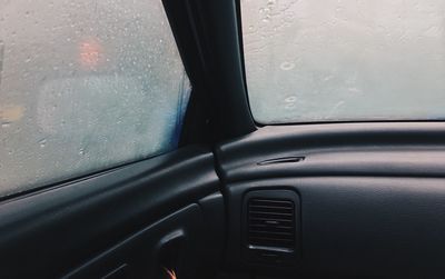 Close-up of wet car window