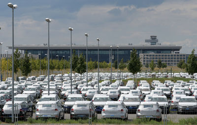 Row of cars on street in city