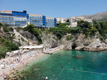 View of buildings by sea