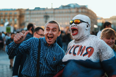 Portrait of people against blurred background