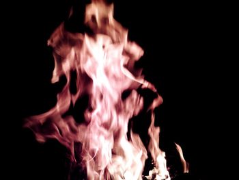 Close-up of fire against black background
