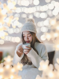 Young woman using mobile phone