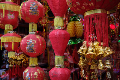 Close-up of lanterns hanging at store