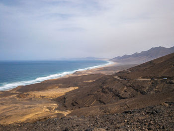 Scenic view of beach against sky